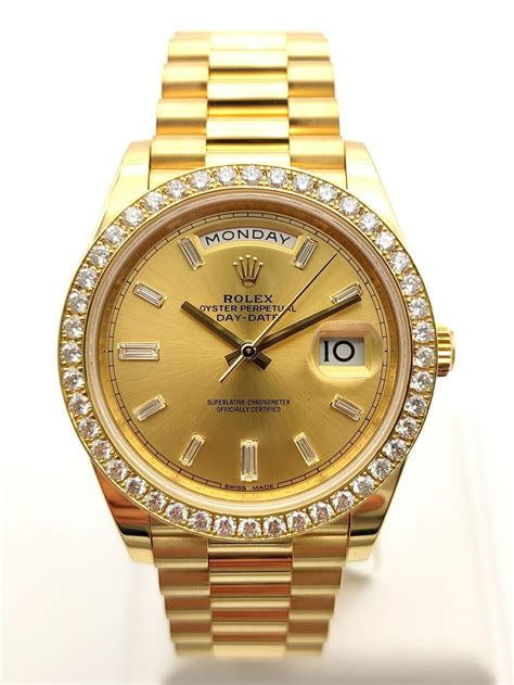 rolex day date 40 gold.